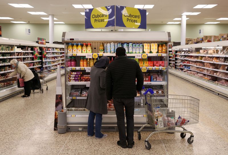 &copy; Reuters. FILE PHOTO: Clubcard price branding inside a branch of a Tesco Extra Supermarket in London, Britain, February 10, 2022. Picture taken February 10, 2022. REUTERS/Paul Childs