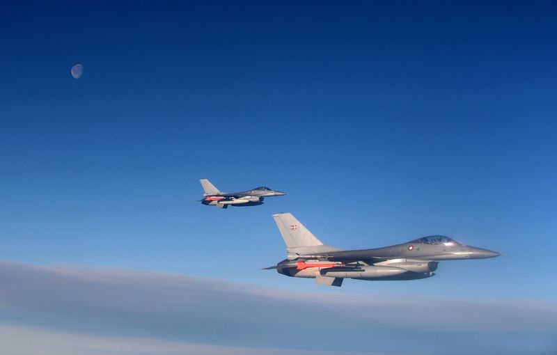 &copy; Reuters. FILE PHOTO: Danish F16 fighter jets demonstrate the interception of a Belgian air force transport plane as they fly over Denmark, January 14, 2020 as part of NATO drills to deter Russian planes from entering allied airspace. Picture taken January 14, 2020