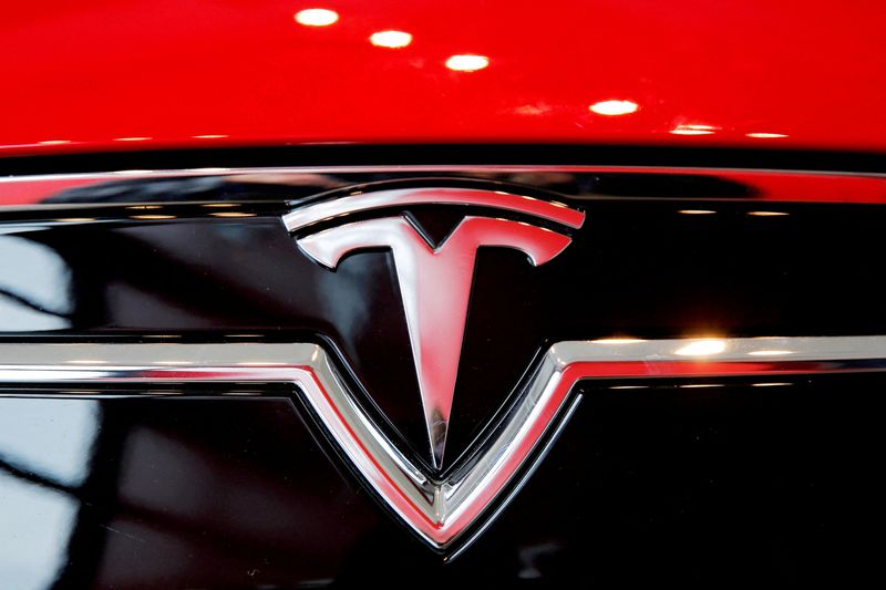 &copy; Reuters. FILE PHOTO: A Tesla logo on a Model S is photographed inside of a Tesla dealership in New York, U.S., April 29, 2016. REUTERS/Lucas Jackson/File Photo