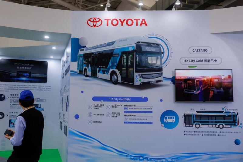 © Reuters. A person looks at Toyota information on display at 2035 E-Mobility Taiwan, an annual electric and autonomous vehicle trade show in Taipei, Taiwan April 13, 2023. REUTERS/Ann Wang/File Photo