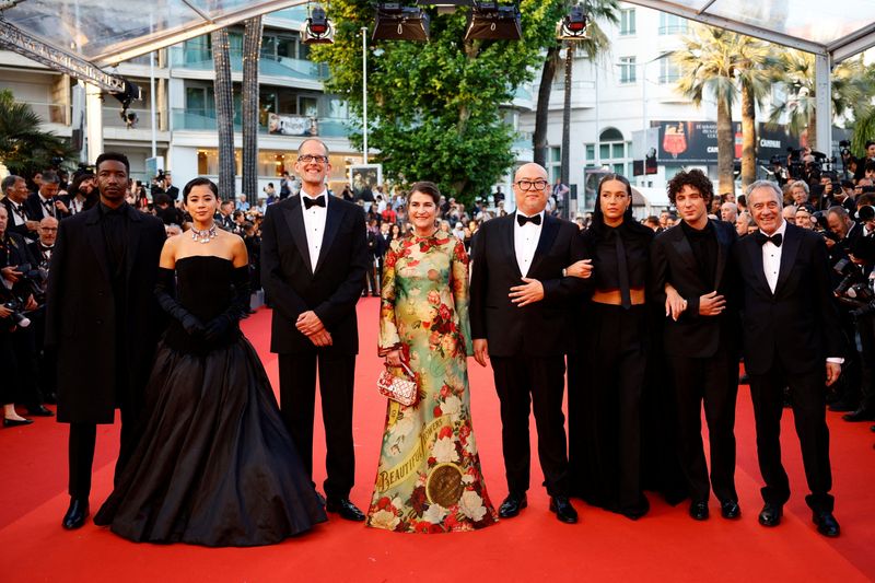 &copy; Reuters. FILE PHOTO: Mamoudou Athie, Leah Lewis, Pete Docter, Denise Ream, Director Peter Sohn, Adele Exarchopoulos, Vincent Lacoste and Jim Morris pose on the red carpet to attend the closing ceremony and the screening of the animated film "Elemental" Out of comp