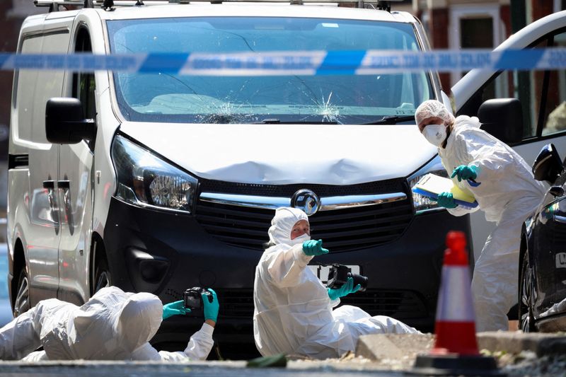 © Reuters. Police forensic officers work near a van in a cordon on the Bentinck Road following a major incident in Nottingham city centre, Nottingham, Britain, June 13, 2023.  REUTERS/Phil Noble     