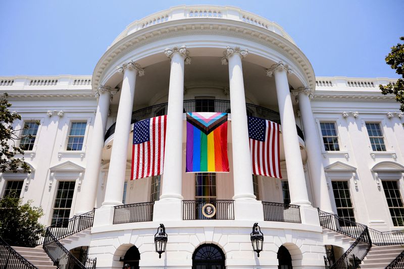 &copy; Reuters. FILE PHOTO: The Progress Pride flag hangs from the balcony of the White House during a Pride Celebration in the South Lawn, hosted by President Joe Biden, in Washington, U.S., June 10, 2023.  REUTERS/Anna Rose Layden NO RESALES. NO ARCHIVES/File Photo