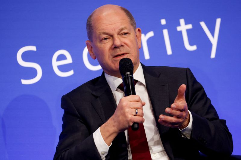 &copy; Reuters. FILE PHOTO: Germany's Chancellor Olaf Scholz takes part in a discussion as he attends the Security Conference in Berlin, Germany November 30, 2022. REUTERS/Michele Tantussi/File Photo