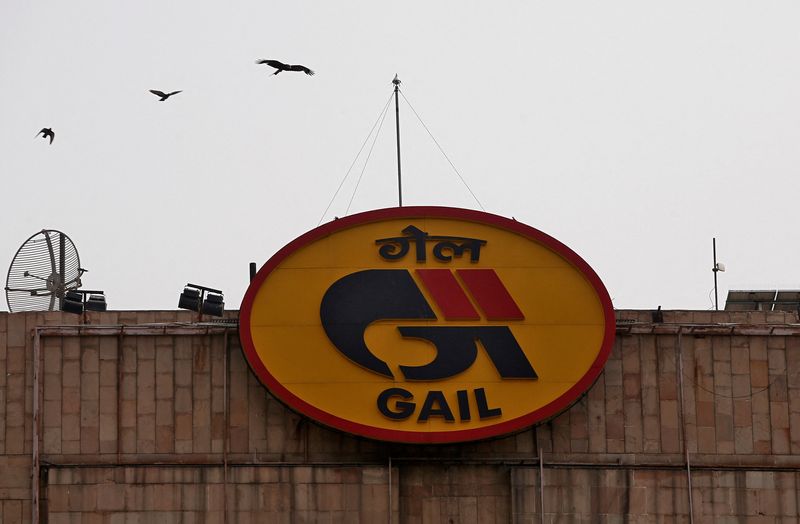 &copy; Reuters. FILE PHOTO: Birds fly past the logo of India's state-owned natural gas utility GAIL (India) Ltd installed on its corporate office building in New Delhi, India, April 26, 2018. REUTERS/Adnan Abidi/File Photo