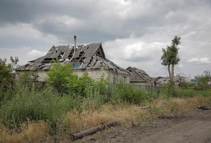 Russian soldiers' corpses line road into liberated Ukrainian village