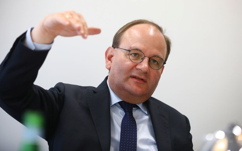 &copy; Reuters. FILE PHOTO: Scientist Ottmar Edenhofer attends a Reuters interview in Berlin, Germany, September 19, 2019. REUTERS/Hannibal Hanschke/File Photo