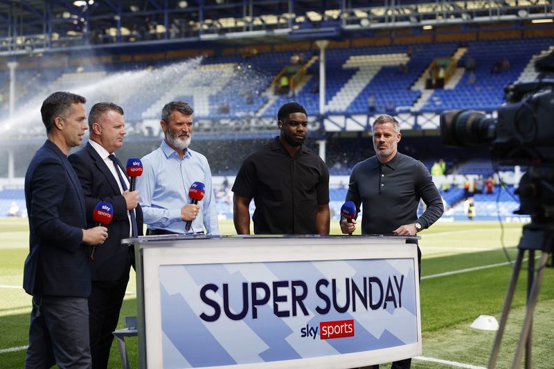&copy; Reuters. FILE PHOTO: Soccer Football - Premier League - Everton v AFC Bournemouth - Goodison Park, Liverpool, Britain - May 28, 2023 TV presenter David Jones with pundits Micah Richards, Roy Keane and Jamie Carragher and former Everton player Graham Stuart ahead o