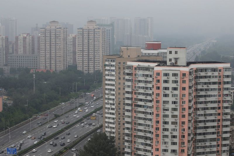 &copy; Reuters. FILE PHOTO: Residential buildings are seen along the Fourth Ring Road in Beijing, China July 16, 2018. REUTERS/Jason Lee