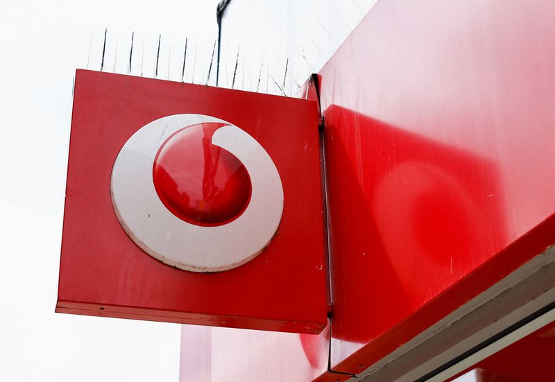 &copy; Reuters. The logo of Vodafone is seen at a Vodafone store in Northwich, Cheshire, Britain, June 7, 2023. REUTERS/Jason Cairnduff