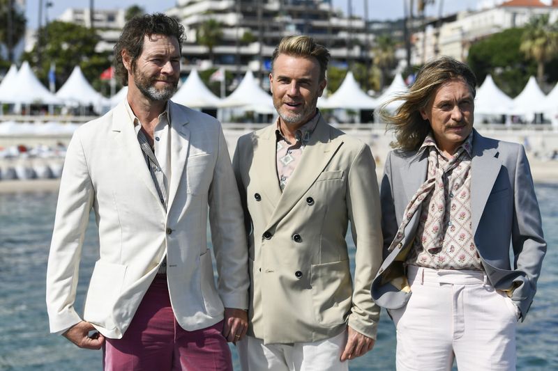 &copy; Reuters. Mark Owen, Gary Barlow and Howard Donald, membros da banda Take That
18/05/2022
REUTERS/Piroschka Van De Wouw