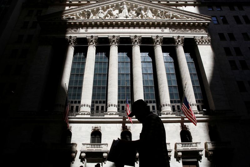 &copy; Reuters. FILE PHOTO: A man passes by the New York Stock Exchange (NYSE) in New York City, U.S., July 11, 2016.  REUTERS/Brendan McDermid