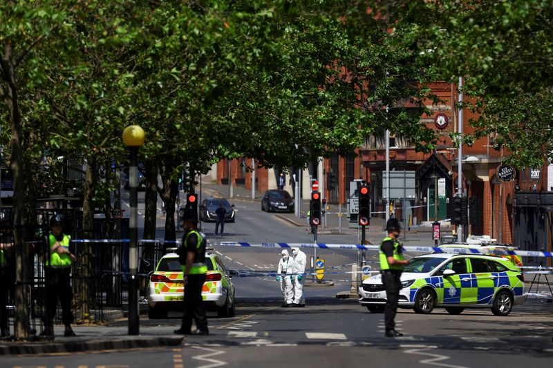&copy; Reuters. FILE PHOTO: Police forensics officers work at a site cordoned with police tape, following a major incident in Nottingham city centre, Nottingham, Britain, June 13, 2023.  REUTERS/Carl Recine/File Photo