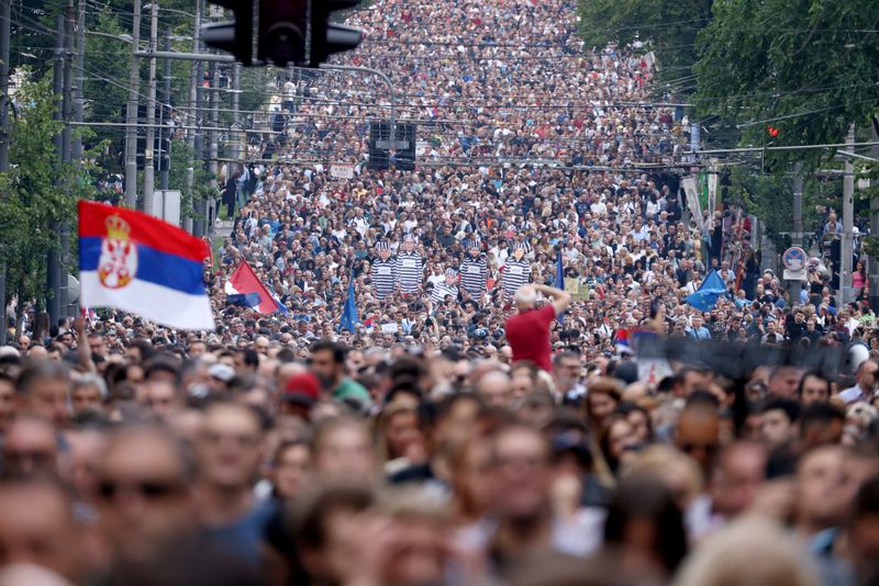 &copy; Reuters. People attend a demonstration "Serbia against violence" organized by Serbia's opposition parties in reaction to the two mass shootings in the same week, in Belgrade, Serbia, June 17, 2023. REUTERS/Marko Djurica