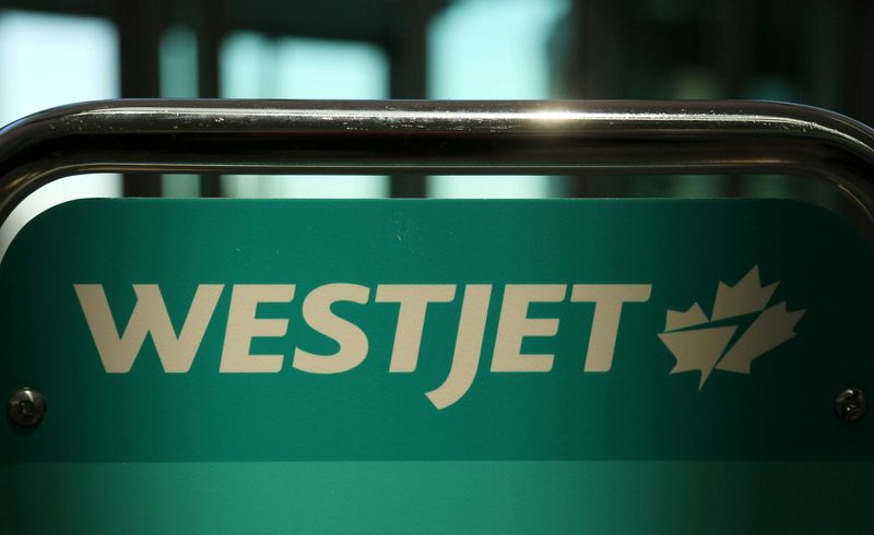 &copy; Reuters. FILE PHOTO: WestJet airline signage is pictured at Vancouver's international airport in Richmond, British Columbia, Canada, February 5, 2019.  REUTERS/Ben Nelms/File Photo