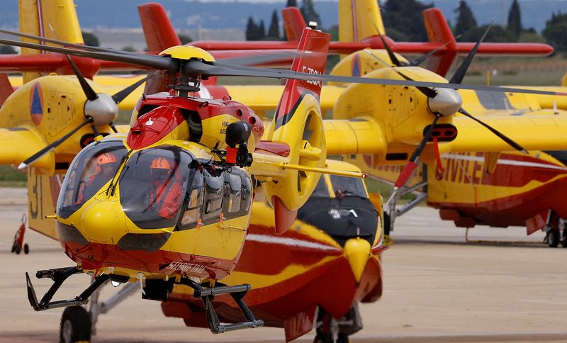 &copy; Reuters. FILE PHOTO: An Airbus H145 French Securite Civile rescue helicopter takes off past Canadair aircrafts during the presentation of the 2023 plan to fight against wildfires, at Nimes-Garons airbase, France, April 25, 2023. REUTERS/Christian Hartmann/File Pho