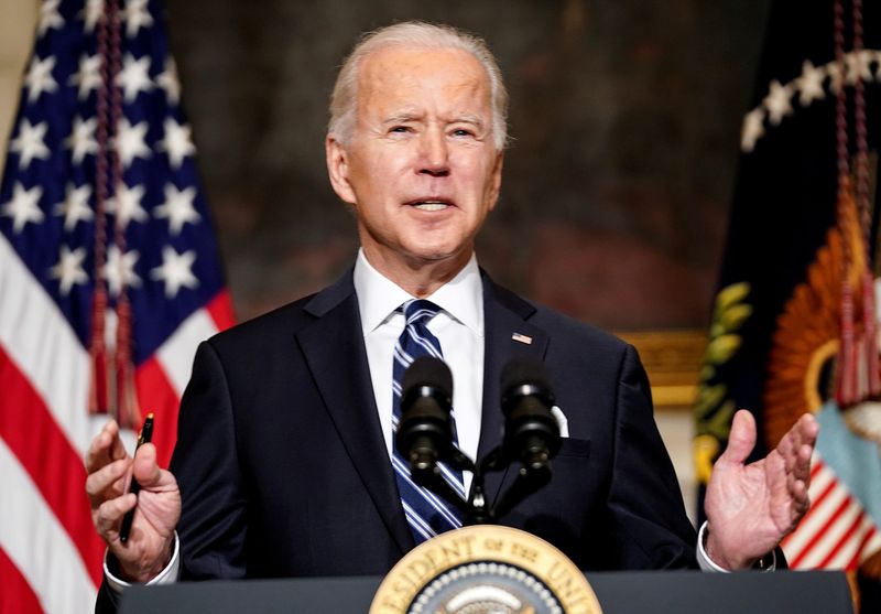 &copy; Reuters. FILE PHOTO: U.S. President Joe Biden delivers remarks on tackling climate change prior to signing executive actions in the State Dining Room at the White House in Washington, U.S., January 27, 2021. REUTERS/Kevin Lamarque/File Photo