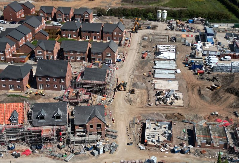 &copy; Reuters. FILE PHOTO: Partly finished houses are seen on a new housing development under construction in Liverpool, Britain June 2, 2023. REUTERS/Phil Noble