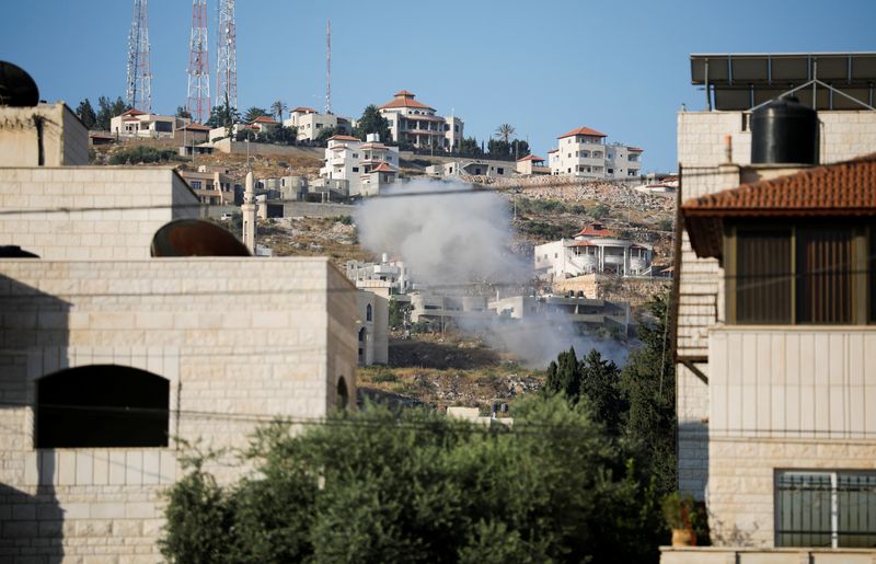 &copy; Reuters. Fumaça é vista durante operação israelense em Jenin, na Cisjordânia ocupada
19/06/2023
REUTERS/Raneen Sawafta