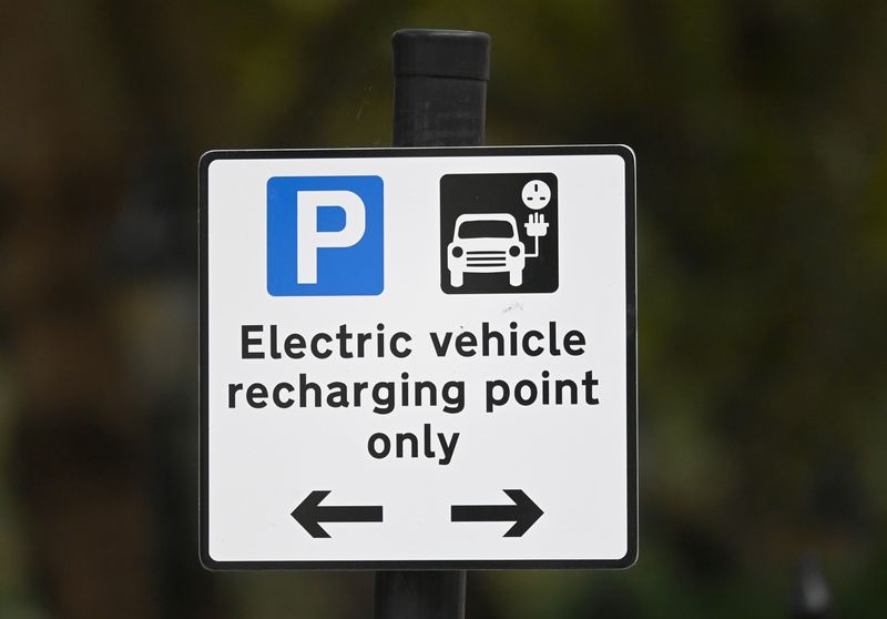 &copy; Reuters. A roadside EV (electric vehicle) charge point sign is seen in London, October 19, 2021. REUTERS/Toby Melville