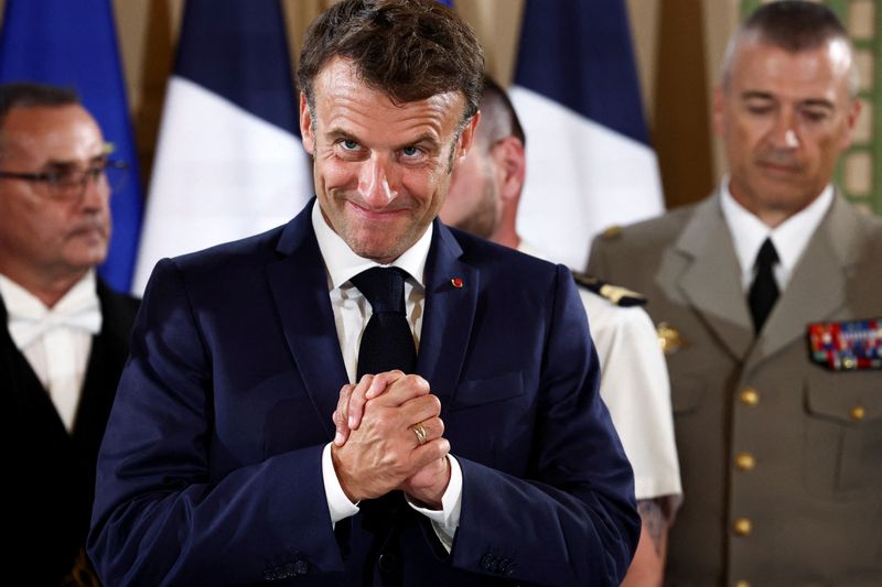 &copy; Reuters. FILE PHOTO: French President Emmanuel Macron greets the audience during the conference on European air and missile defence, attended by EU defence ministers, on the sidelines of the International Paris Air Show, at the Hotel des Invalides in Paris, France