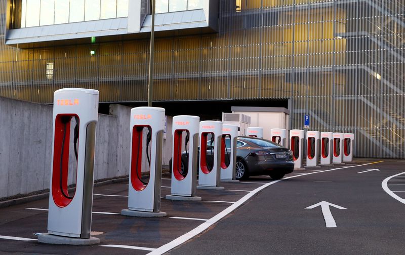 &copy; Reuters. FILE PHOTO: Tesla Supercharger stations are seen at a motorway service area near Affoltern am Albis, Switzerland October 20, 2021. REUTERS/Arnd Wiegmann/File Photo