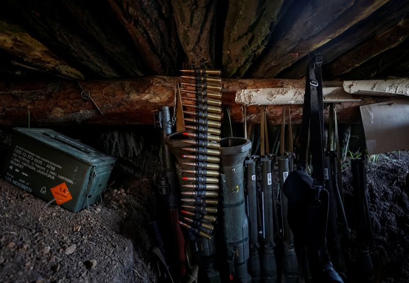© Reuters. FILE PHOTO: Weapons of Ukrainian service members are seen in a trench at position at a front line, amid Russia's attack on Ukraine, in Donetsk region, Ukraine May 5, 2023. Ukraine Radio Free Europe/Radio Liberty/Serhii Nuzhnenko via REUTERS/File Photo