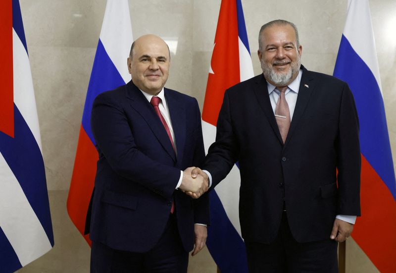&copy; Reuters. FILE PHOTO: Russian Prime Minister Mikhail Mishustin shake hands with Cuban Prime Minister Manuel Marrero Cruz during a meeting in Moscow, Russia June 13, 2023. Sputnik/Dmitry Astakhov/Pool via REUTERS