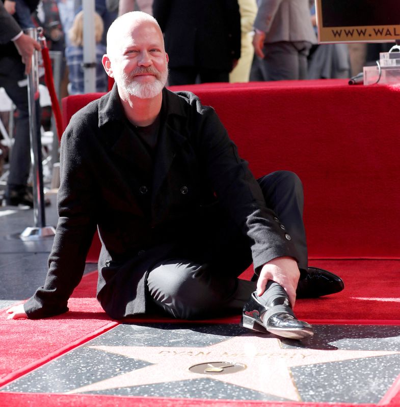 &copy; Reuters. FILE PHOTO: Director Ryan Murphy poses on his star after it was unveiled on the Hollywood Walk of Fame in Los Angeles, California, U.S., December 4, 2018. REUTERS/Mario Anzuoni/File Photo