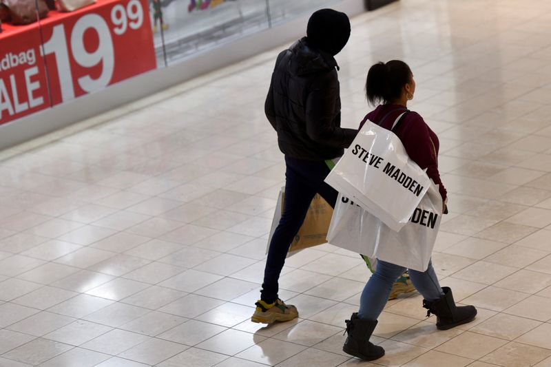 &copy; Reuters. Shoppers walk with Steve Madden bags as pre-Thanksgiving and Christmas holiday shopping accelerates at the King of Prussia Mall in King of Prussia, Pennsylvania, U.S. November 22, 2019. REUTERS/Mark Makela