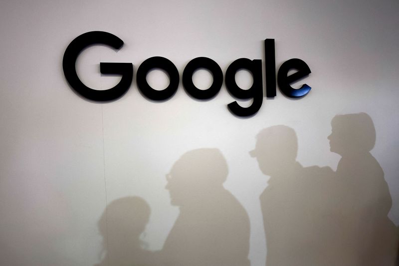 &copy; Reuters. FILE PHOTO: Visitors cast their shadows past the logo of Google at the Viva Technology conference dedicated to innovation and startups at Porte de Versailles exhibition center in Paris, France, June 15, 2023. REUTERS/Gonzalo Fuentes/File Photo