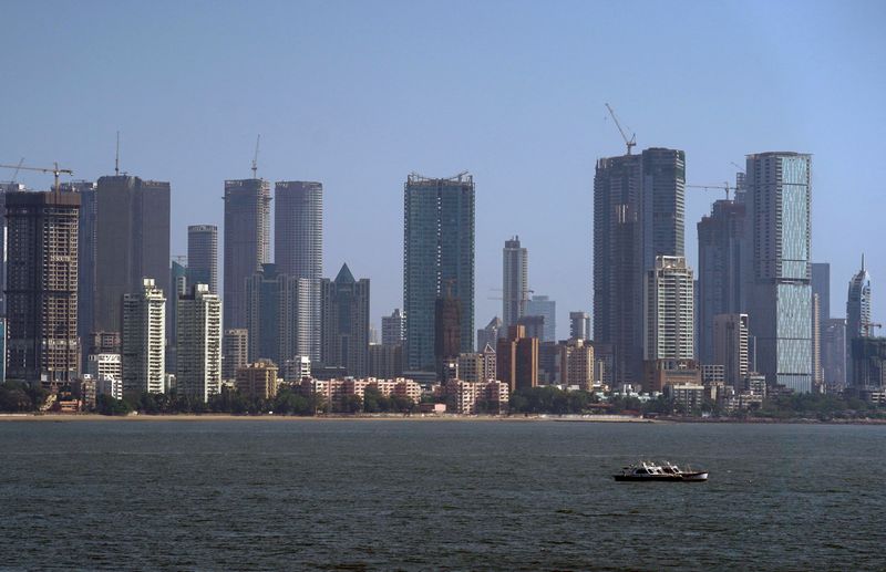 &copy; Reuters. FILE PHOTO: Mumbai's financial district skyline is pictured, after air pollution level started to drop during a nationwide lockdown to slow the spreading of the coronavirus disease (COVID-19), India, April 24, 2020. REUTERS/Hemanshi Kamani/File Photo