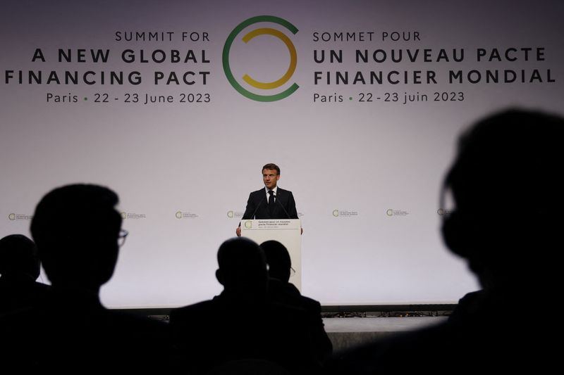 &copy; Reuters. Emmanuel Macron lors de la session d'ouverture du sommet du nouveau pacte financier mondial au Palais Brogniart à Paris, France. /Photo prise le 22 juin 2023/REUTERS/Ludovic Marin