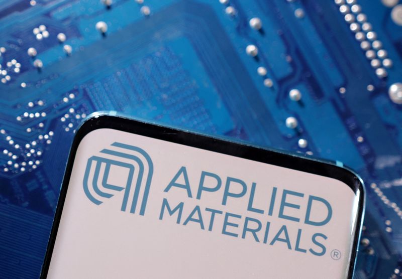 &copy; Reuters. FILE PHOTO: A smartphone with a displayed Applied Materials logo is placed on a computer motherboard in this illustration taken March 6, 2023. REUTERS/Dado Ruvic/Illustration/ File Photo
