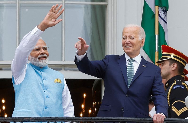 &copy; Reuters. India’s Prime Minister Narendra Modi and U.S. President Joe Biden wave and gesture to the crowd as they stand on the Truman Balcony of the White House after an official State Arrival Ceremony held at the start of Modi's visit to the White House in Washi