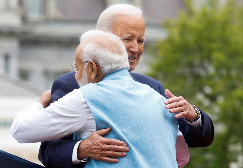 &copy; Reuters. U.S. President Joe Biden hugs India’s Prime Minister Narendra Modi onstage after introducing Modi during an official State Arrival Ceremony held at the start of Modi's visit to the White House in Washington, U.S., June 22, 2023. REUTERS/Jonathan Ernst