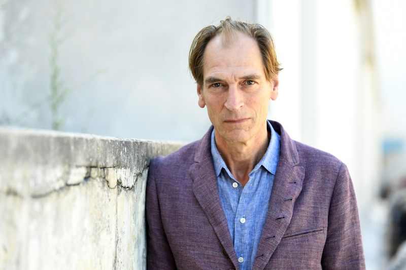 &copy; Reuters. FILE PHOTO: The 76th Venice Film Festival - Screening of the film "The Painted Bird" in competition - Venice, Italy September 3, 2019 - Actor Julian Sands poses before an interview. REUTERS/Piroschka van de Wouw/File Photo