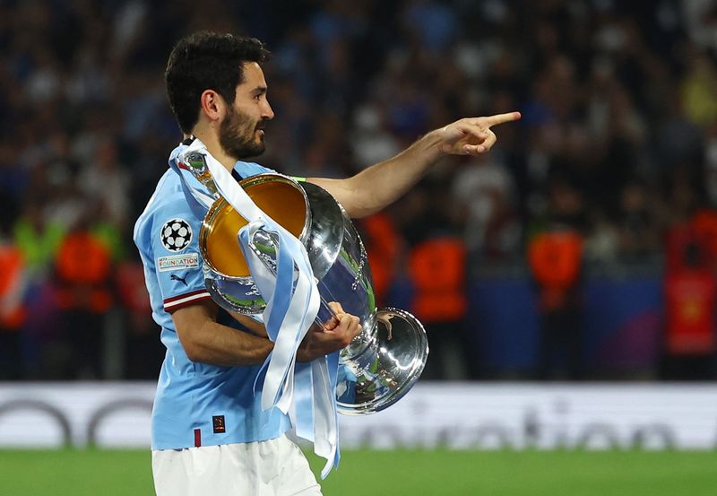 &copy; Reuters. Ilkay Gundogan celebra título da Liga dos Campeões, em Istambul, Turquia
11/06/2023 
REUTERS/Molly Darlington