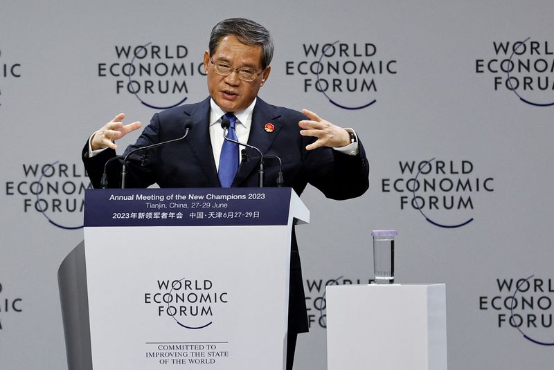 &copy; Reuters. Chinese Premier Li Qiang, speaks at the opening session of the World Economic Forum's 14th Annual Meeting of the New Champions 2023, at the Meijiang Convention and Exhibition Centre in Tianjin, China June 27, 2023. REUTERS/Tingshu Wang