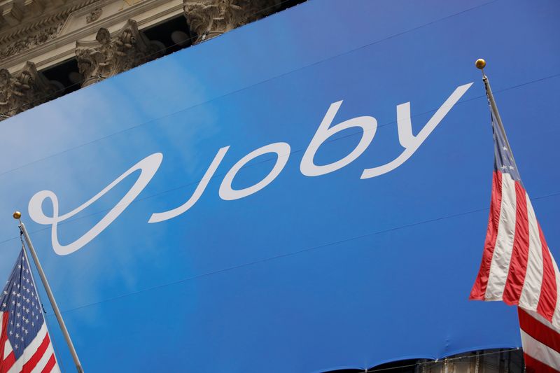 &copy; Reuters. FILE PHOTO: The Joby Aviation logo is seen outside of the New York Stock Exchange (NYSE) ahead of their listing in Manhattan, New York City, U.S., August 11, 2021. REUTERS/Andrew Kelly
