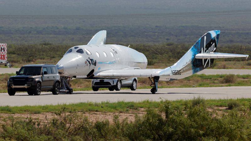 &copy; Reuters. FILE PHOTO: Virgin Galactic's passenger rocket plane VSS Unity is towed to the hangar after billionaire entrepreneur Richard Branson and his crew, reached the edge of space, at Spaceport America near Truth or Consequences, New Mexico, U.S., July 11, 2021.