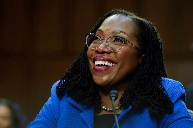 &copy; Reuters. FILE PHOTO: Judge Ketanji Brown Jackson listens to U.S. Senator Cory Booker (D-NJ) speak on the third day of the U.S. Senate Judiciary Committee confirmation hearings on her nomination to the U.S. Supreme Court, on Capitol Hill in Washington, U.S., March 