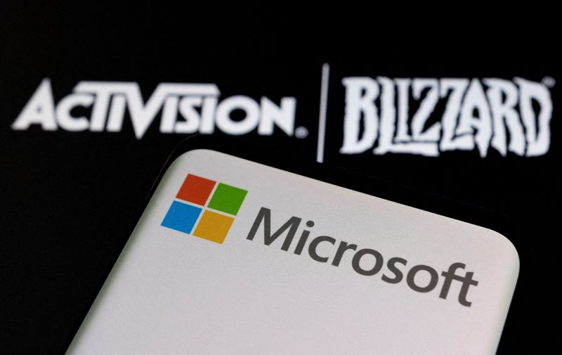 &copy; Reuters. Logo da Microsoft e Activision Blizzard
18/1/2022 REUTERS/Dado Ruvic/Ilustração/Arquivo