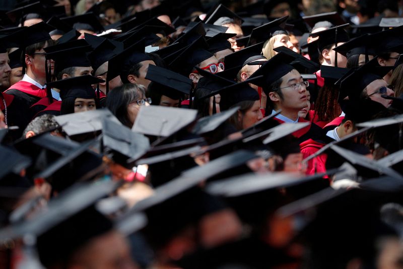 &copy; Reuters. FILE PHOTO: Students attend the 367th Commencement Exercises at Harvard University in Cambridge, Massachusetts, U.S., May 24, 2018.   REUTERS/Brian Snyder/File Photo