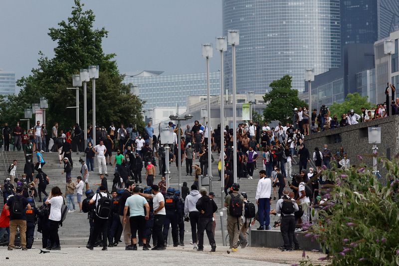 Clashes erupt after march in tribute to teenager shot dead in Paris suburb