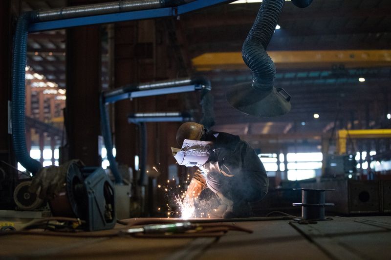 &copy; Reuters. An employee works at a steel processing production line at a factory in Hefei, Anhui province, China February 21, 2020. China Daily via REUTERS