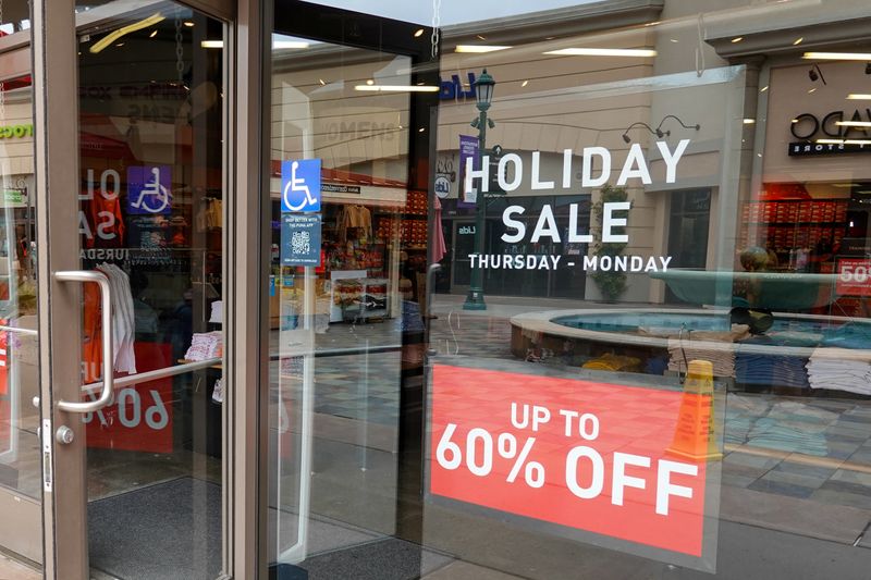 &copy; Reuters. FILE PHOTO: Memorial Day sale signs are shown at a shopping mall in Carlsbad, California, U.S., May 25, 2023. REUTERS/Mike Blake/File Photo