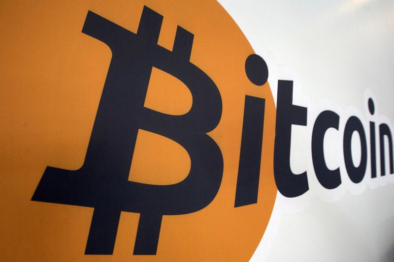 &copy; Reuters. FILE PHOTO: A Bitcoin logo is displayed at the Bitcoin Center New York City in New York's financial district July 28, 2015. REUTERS/Brendan McDermid/File Photo