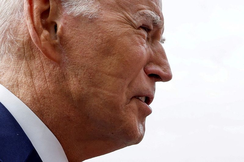 &copy; Reuters. U.S. President Joe Biden carries marks left by the straps of a continuous positive airway pressure machine, or CPAP, visible on his face as he talks to reporters at the White House in Washington, U.S. June 28, 2023.  REUTERS/Jonathan Ernst/File photo