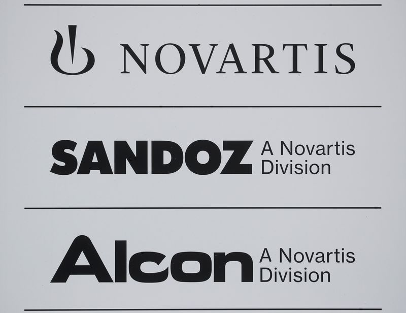 &copy; Reuters. FILE PHOTO: The logo of Swiss drugmaker Novartis and its divisions Sandoz and Alcon are seen at an office building in Rotkreuz, Switzerland, January 29, 2020. REUTERS/Arnd Wiegmann/Fle Photo